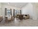 Spacious living area featuring tile floors, neutral tones, and large windows offering natural light at 5332 E Thunder Hawk Rd, Cave Creek, AZ 85331