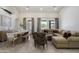Spacious living area featuring tile floors, neutral tones, and large windows offering natural light at 5332 E Thunder Hawk Rd, Cave Creek, AZ 85331