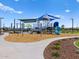 Playground featuring sun shades, slides, and climbing areas, set on a mulch base at 5464 S 246Th Ln, Buckeye, AZ 85326