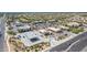 Aerial view of commercial shopping and retail centers, and gas stations near residential area at 6648 S Lyon Dr, Gilbert, AZ 85298