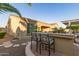 Inviting backyard patio featuring a built-in bar, seating, and well-manicured landscaping for outdoor entertaining at 6648 S Lyon Dr, Gilbert, AZ 85298