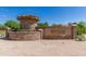 Elegant stone entrance sign for Seville Golf & Country Club welcomes residents and guests at 6648 S Lyon Dr, Gilbert, AZ 85298