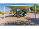 Shaded playground with slides and climbing structures offers fun in the sun at 6648 S Lyon Dr, Gilbert, AZ 85298