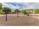 A playground with swings and a covered play structure offers hours of outdoor fun at 6648 S Lyon Dr, Gilbert, AZ 85298