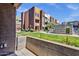 Exterior view showing a manicured backyard and townhome exteriors on a sunny day at 6745 N 93Rd Ave # 1158, Glendale, AZ 85305