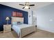 Relaxing bedroom with an ensuite bathroom, a comfortable bed, and a soothing atmosphere at 6745 N 93Rd Ave # 1158, Glendale, AZ 85305