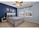 Inviting bedroom with a comfortable bed, natural light, and modern decor at 6745 N 93Rd Ave # 1158, Glendale, AZ 85305