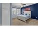 Charming bedroom with a comfortable bed, natural light, and stylish decor at 6745 N 93Rd Ave # 1158, Glendale, AZ 85305