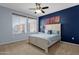 Cozy bedroom featuring a comfortable bed, natural light, and a modern design at 6745 N 93Rd Ave # 1158, Glendale, AZ 85305