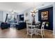 Open-concept living area featuring hardwood floors, modern furniture, and ample natural light at 6745 N 93Rd Ave # 1158, Glendale, AZ 85305