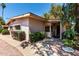 Inviting home exterior with a landscaped walkway leading to the entrance at 725 S Power Rd # 101, Mesa, AZ 85206