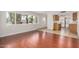 Open-concept layout with tile floors connecting the living room to the adjacent kitchen at 725 S Power Rd # 101, Mesa, AZ 85206