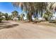 Scenic view of mature trees and well-maintained landscaping enhancing the property at 725 S Power Rd # 101, Mesa, AZ 85206