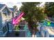 Charming townhomes overlook a community pool, surrounded by lush greenery at 860 N Mcqueen Rd # 1151, Chandler, AZ 85225