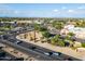 Aerial shot of a commercial district and road with access to local shopping at 860 N Mcqueen Rd # 1151, Chandler, AZ 85225