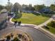 Aerial view of a community featuring large green space and mature trees at 860 N Mcqueen Rd # 1151, Chandler, AZ 85225