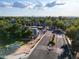 An aerial view of the charming New Castle community featuring well-maintained streets and landscaping at 860 N Mcqueen Rd # 1151, Chandler, AZ 85225