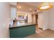 Bright kitchen featuring stainless steel appliances, tile floors, and an eat-in bar at 860 N Mcqueen Rd # 1151, Chandler, AZ 85225