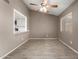 Bright dining area featuring tile floors, natural light and an open view to the kitchen at 9106 N 68Th Ln, Peoria, AZ 85345