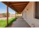 Covered patio offering a shady retreat, enhancing the outdoor living experience at 9106 N 68Th Ln, Peoria, AZ 85345