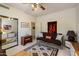 This carpeted bedroom offers a ceiling fan, wardrobe and decorative rug at 10152 E Aster Dr, Scottsdale, AZ 85260