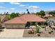 Aerial view of a single-Gathering home with a three-car garage and desert landscaping at 10152 E Aster Dr, Scottsdale, AZ 85260