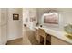 Hallway has an ample desk space with built in storage at 10152 E Aster Dr, Scottsdale, AZ 85260