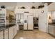 Modern kitchen with stainless steel appliances and granite countertops at 10152 E Aster Dr, Scottsdale, AZ 85260