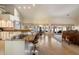 Open concept floorplan showing the kitchen island and direct view to the backyard pool at 10152 E Aster Dr, Scottsdale, AZ 85260