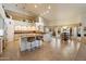 Open kitchen with island seating, sleek countertops, and easy access to the dining area at 10152 E Aster Dr, Scottsdale, AZ 85260