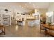 Bright kitchen with granite countertops, tile flooring, and ample cabinet storage at 10152 E Aster Dr, Scottsdale, AZ 85260