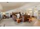 Expansive living room with vaulted ceilings, comfortable seating, and a view of the entertainment center at 10152 E Aster Dr, Scottsdale, AZ 85260