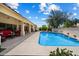 Inviting pool and a covered patio, perfect for relaxing and entertaining outdoors at 10152 E Aster Dr, Scottsdale, AZ 85260