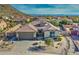 Charming home with desert landscaping, a spacious driveway, and great curb appeal at 1078 W Desert Aster Rd, San Tan Valley, AZ 85143