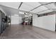 Well-organized garage with plenty of storage and space for vehicles at 1078 W Desert Aster Rd, San Tan Valley, AZ 85143
