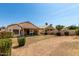 Expansive backyard featuring a covered patio and low-maintenance landscaping, creating a private outdoor oasis at 11518 W Dana Ln, Avondale, AZ 85392