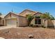 Exterior showcasing a well-maintained single-Gathering home, desert landscaping, and charming curb appeal at 11518 W Dana Ln, Avondale, AZ 85392