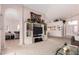 Living room featuring neutral walls, carpet, and an entertainment center at 11518 W Dana Ln, Avondale, AZ 85392