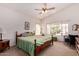 Bright bedroom features a ceiling fan, and a window offering plenty of natural light at 11518 W Dana Ln, Avondale, AZ 85392