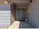 A close-up of an inviting front entrance with security doors and sidelight window at 12021 S Tomi Dr, Phoenix, AZ 85044