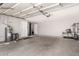 Large two-car garage providing ample space for storage and parking at 12021 S Tomi Dr, Phoenix, AZ 85044