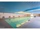 Bright indoor swimming pool with natural light and a calming atmosphere at 12021 S Tomi Dr, Phoenix, AZ 85044