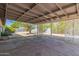 Covered patio with concrete pavers, lattice features and desert landscaping at 12021 S Tomi Dr, Phoenix, AZ 85044
