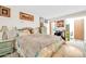 Bright and airy bedroom with a comfortable bed and neutral decor at 13207 N 98Th Ave # L, Sun City, AZ 85351