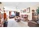 Comfortable living room with plush seating, ceiling fan, and an inviting atmosphere at 13207 N 98Th Ave # L, Sun City, AZ 85351