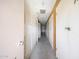 Well-lit hallway showcasing storage units offering a clean and organized storage solution at 13224 N 98Th Ave # L, Sun City, AZ 85351