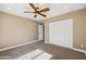 Bedroom featuring neutral walls, carpet, a ceiling fan, recessed lights, and closet with bi-fold doors at 14029 N Burning Tree Pl, Phoenix, AZ 85022
