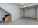 Spacious garage with ample storage space and potential for various uses at 1411 E Orangewood Ave # 237, Phoenix, AZ 85020