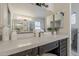 Bathroom vanity with double sinks, elegant mirrors and stylish fixtures at 1444 E Boston St, Chandler, AZ 85225
