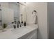 Bathroom featuring a modern white vanity with a marble countertop and sleek fixtures at 1444 E Boston St, Chandler, AZ 85225
